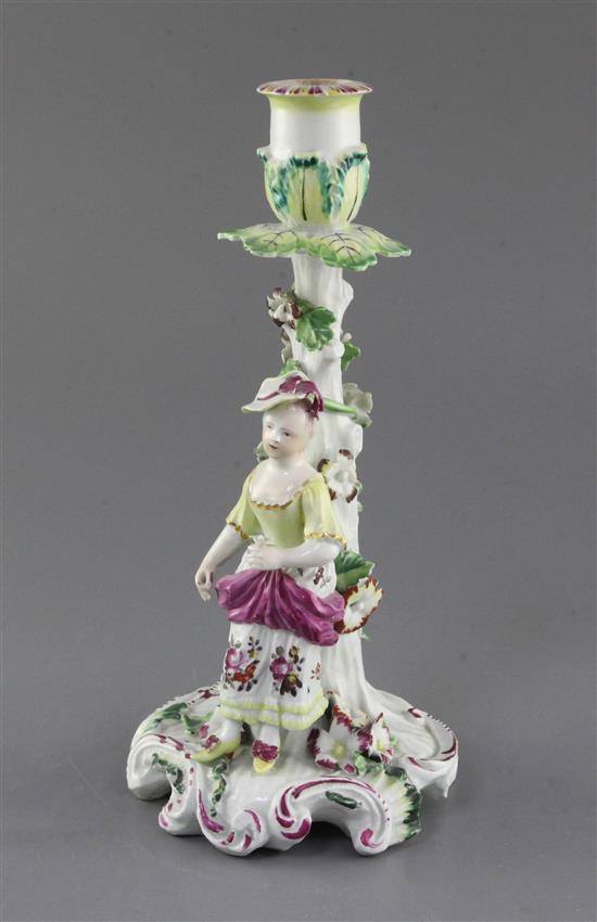 A Derby Pale Family candlestick figure, c.1756-8, h. 25cm, losses to flowers and drip pan